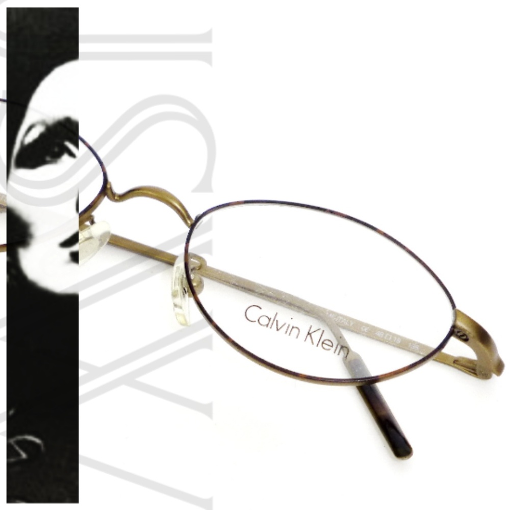 NOS Calvin Klein 150 552 Solid Bronze Thin Rim Designer Eyeglasses made in Italy